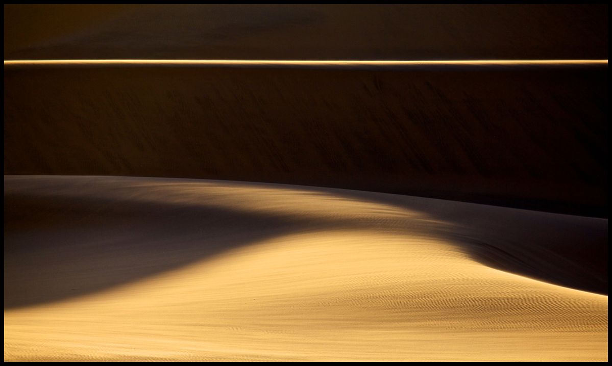 Sunset over Namibian dunes